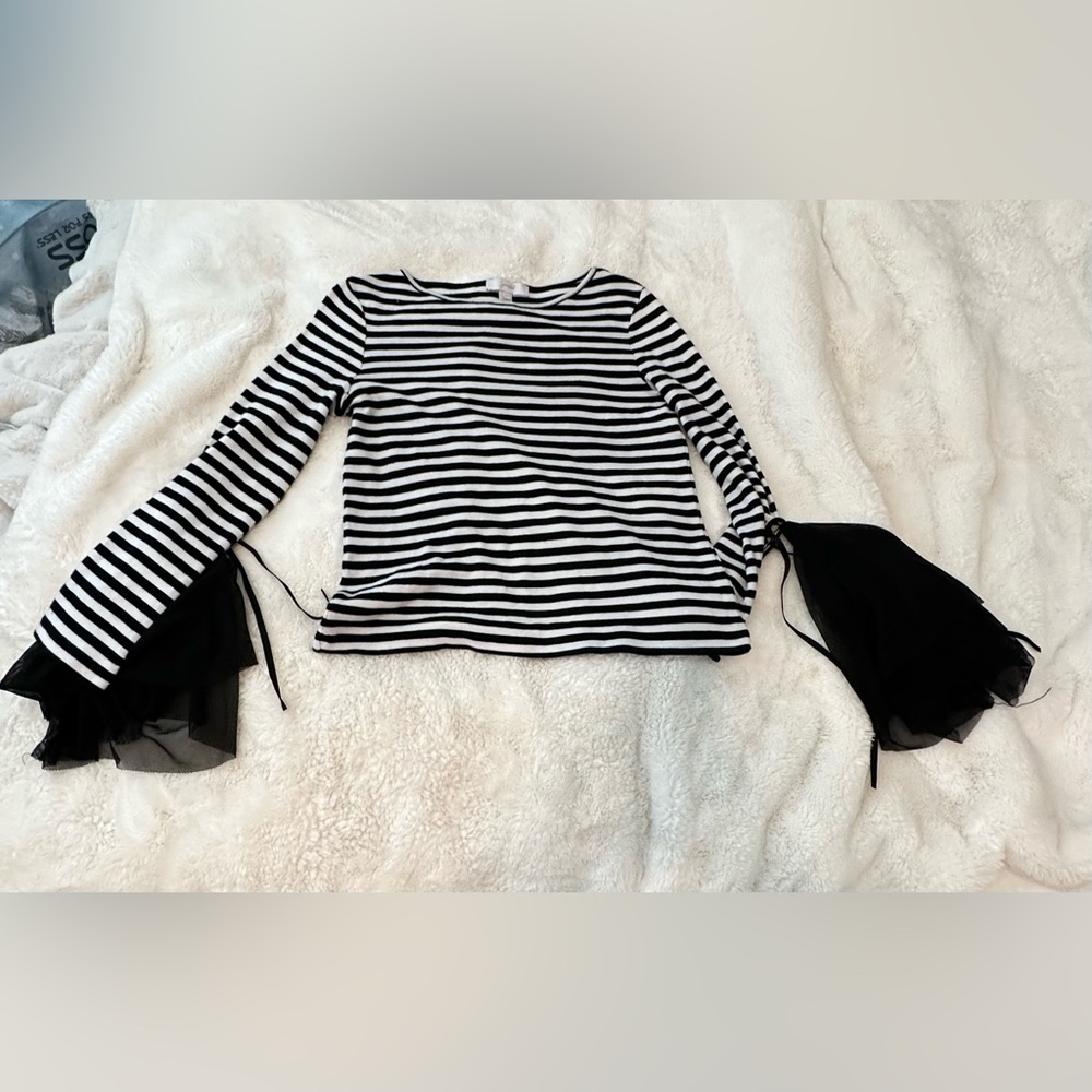 Women black and white striped long sleeve shirt with lace on sleeves and size S.